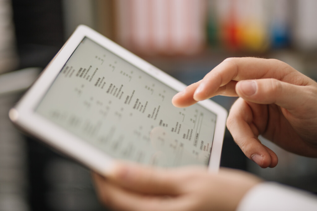 crop unrecognizable worker with tablet